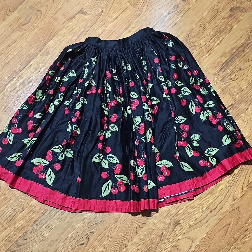 Pinup Couture Black Cherry Swing Skirt with Red Hem